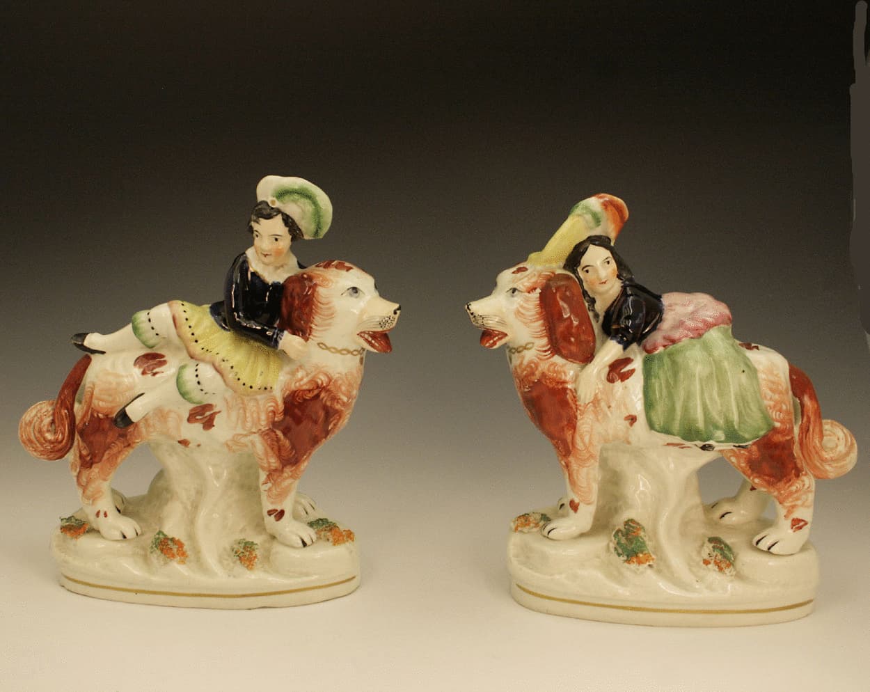 Staffordshire pottery figures of Children riding Dogs - John Howard