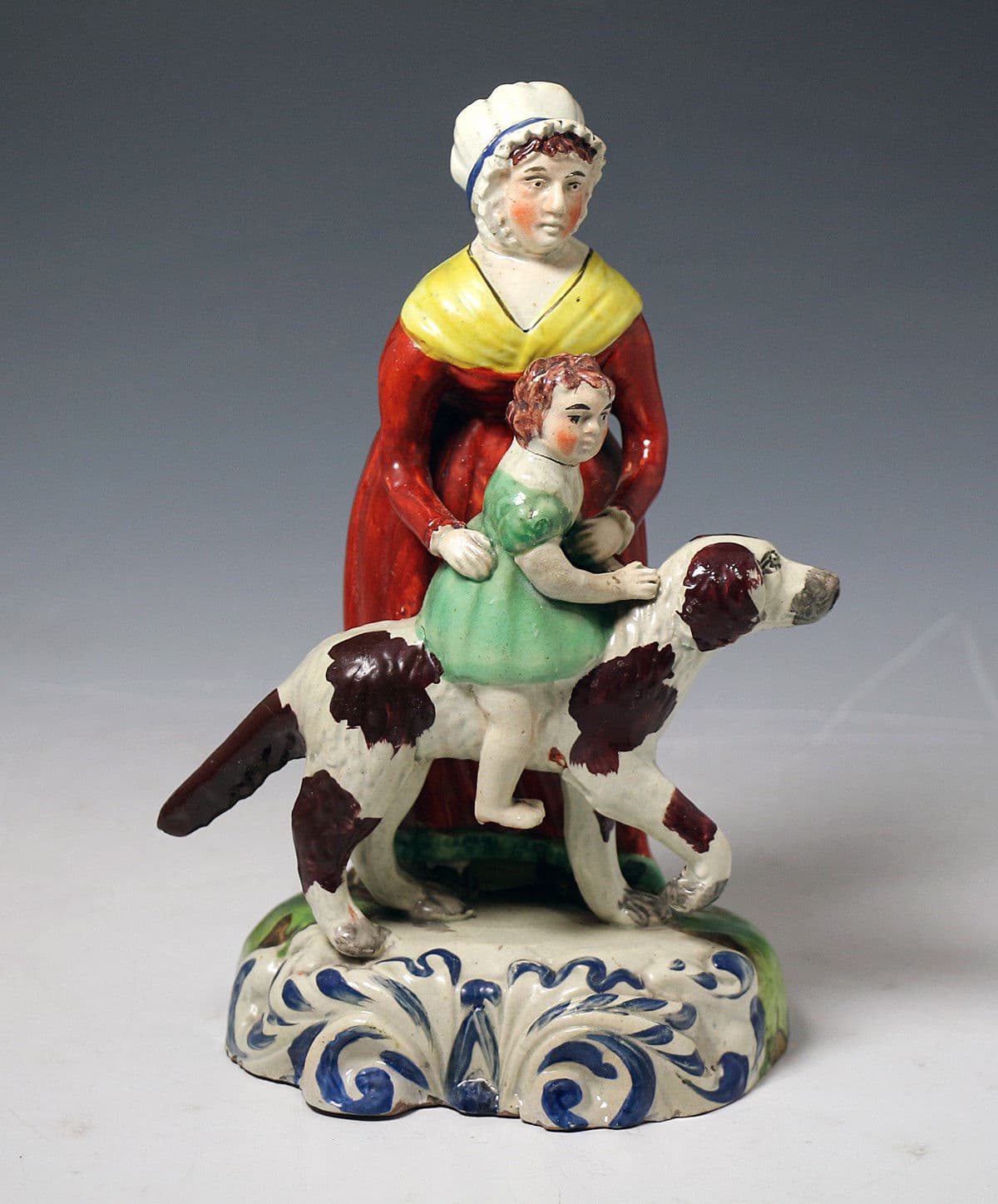 Antique Staffordshire pottery figure of a Nanny with child and dog ...