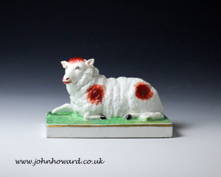 Staffordshire figure of a ewe on oblong base, English early 19th century period