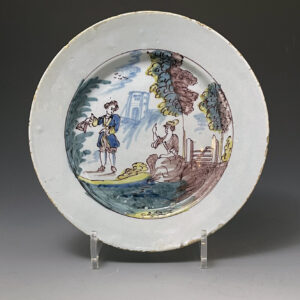 English delftware pottery plate with figures in landscape 18th century Liverpool