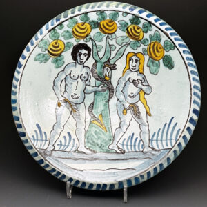 English delftware blue dash charger of the Temptation of Adam and Eve,  Brislington circa 1680