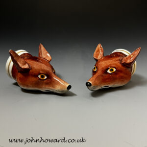 Pair of Staffordshire pottery pearlware fox head stirrup cups circa 1820