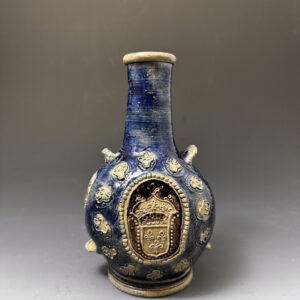 Westerwald salt glaze stoneware standing costrel decorated with the French Coat of Arms 17th century Germany.